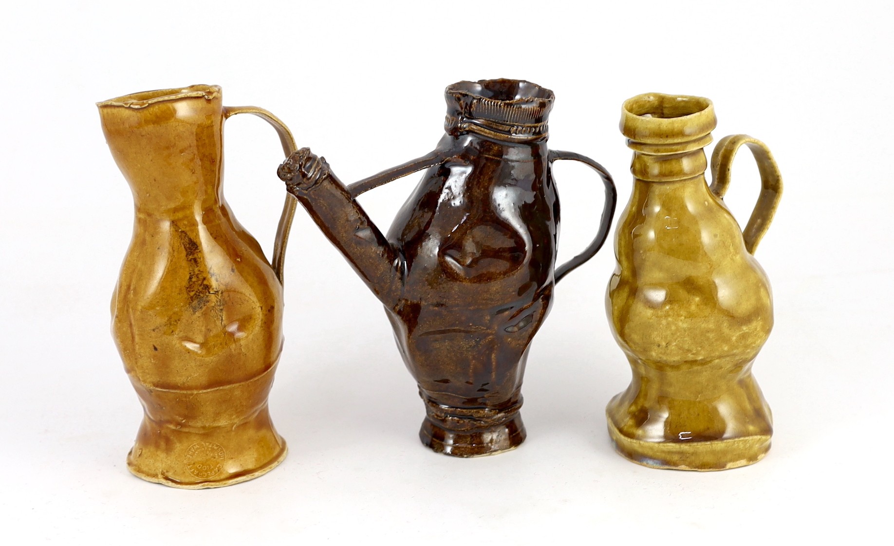 Philip Egin (b.1959), a series of three crumpled monochrome glazed pottery jugs, c.2020, 16.7cm - 17.5cm